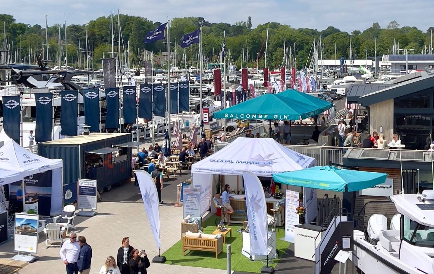 Elevated view of Swanwick Marina with flags and exhibitor tents