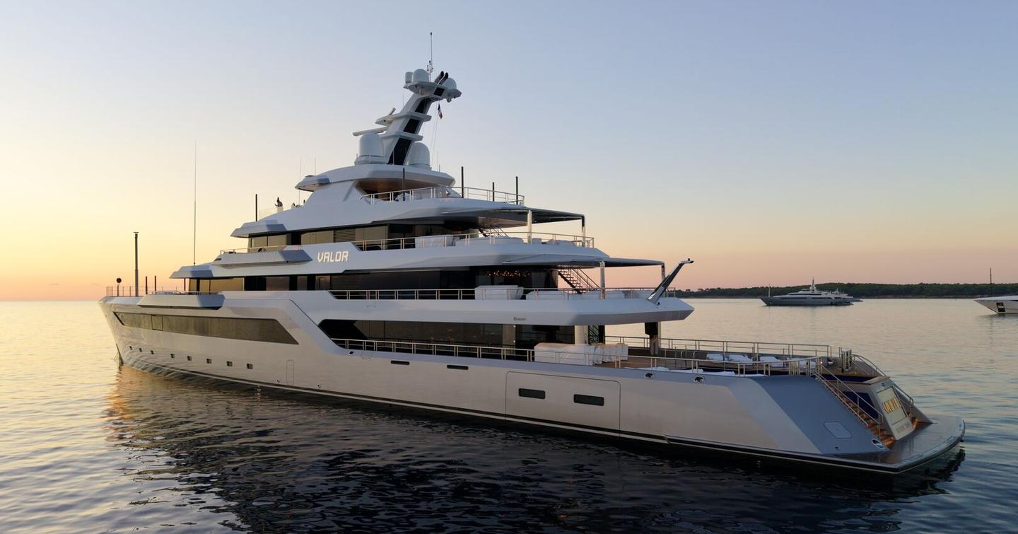 Superyacht Valor at anchor with sun setting