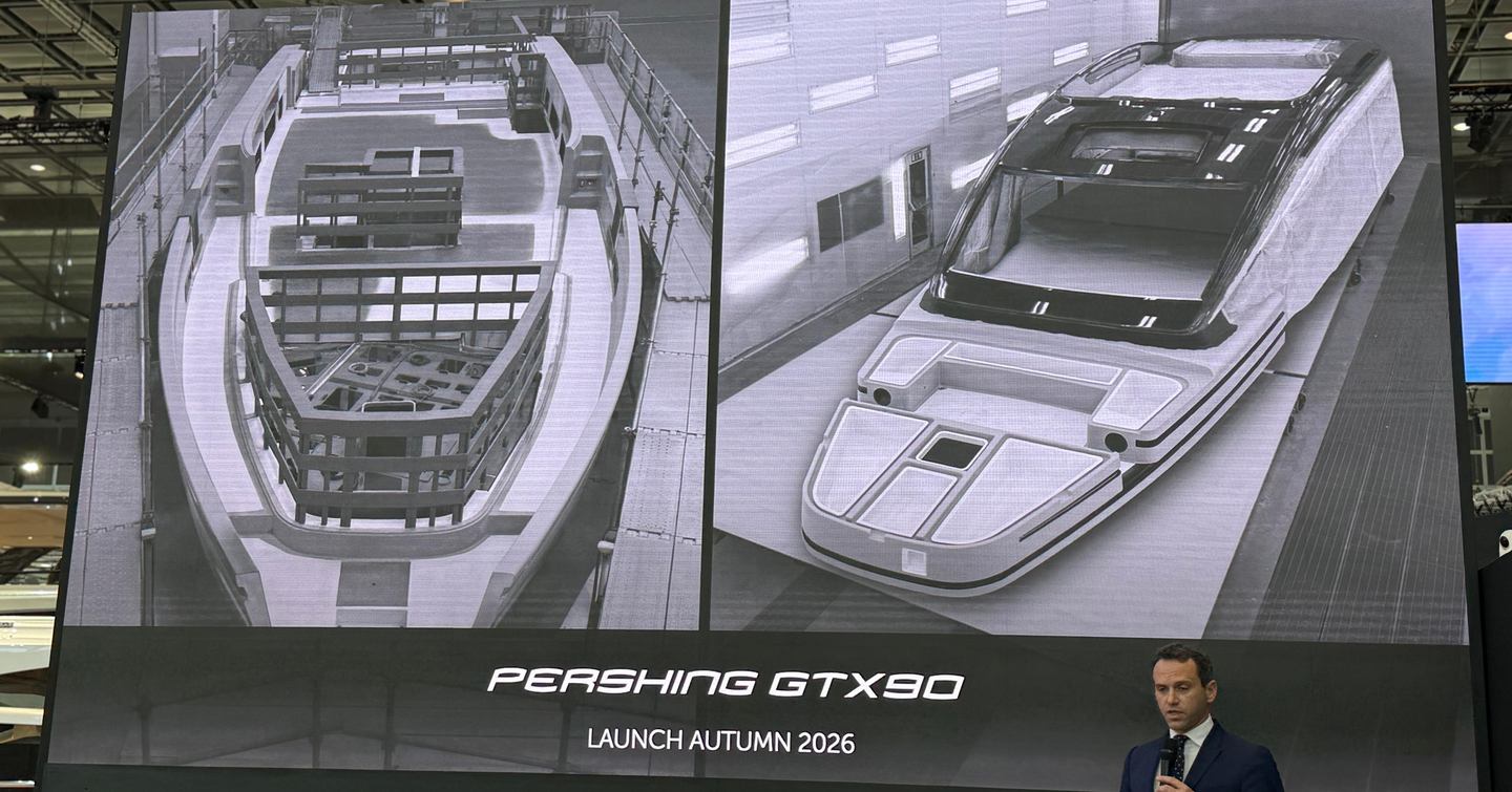 Ferretti CEO in front of renderings of Pershing GTX90 motor yacht at boot Dusseldorf 2026 press conference