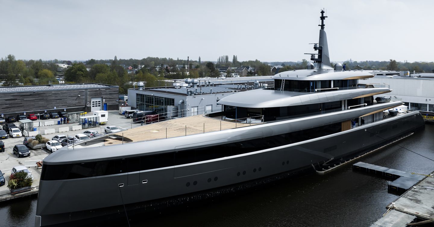 Front side angle view of superyacht OBSIDIAN at a dock.