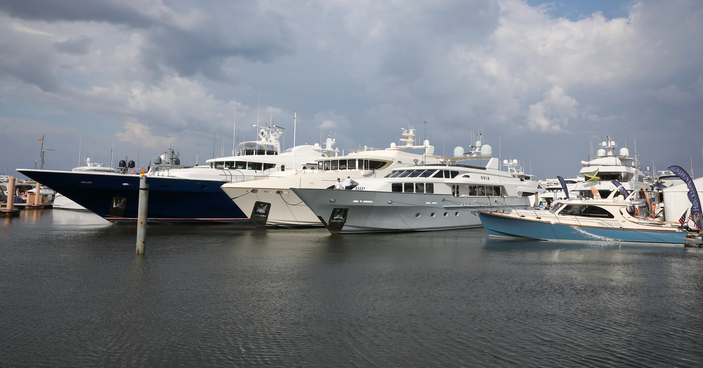 Line of superyachts berthed at Palm Beach International Boat Show.