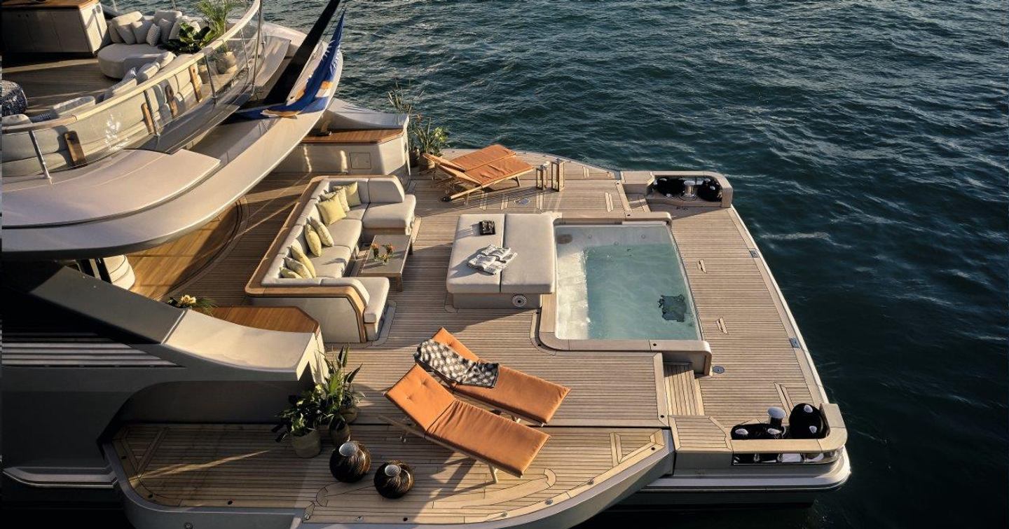 Benetti Oasis 40M beach club and infinity pool with sofas and sun loungers