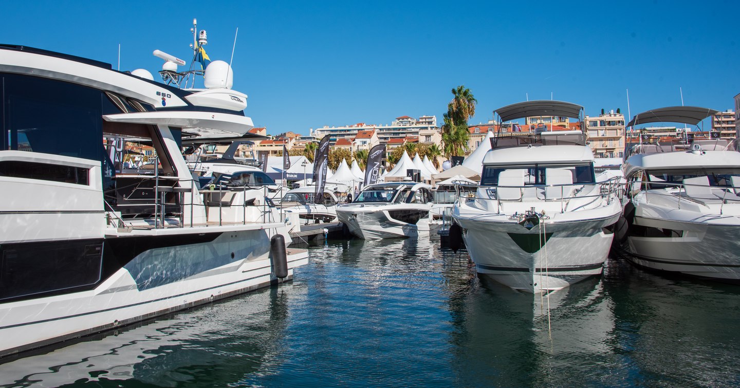 Lines of motor yachts berthed in Vieux Port, Cannes.