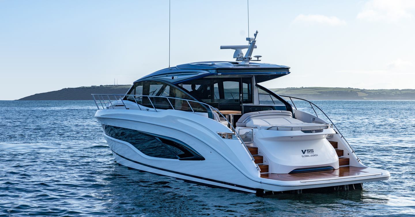 Princess V55 rear view showing hydraulic swim platform and cockpit steps on twin shaft-drive sportsboat