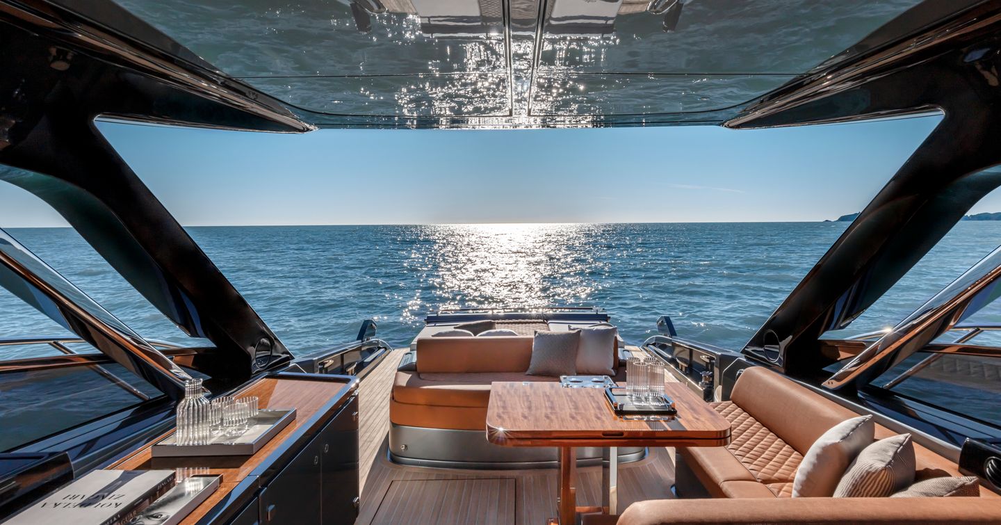 56' Rivale Hard Top looking out to sea with seating and tables visible