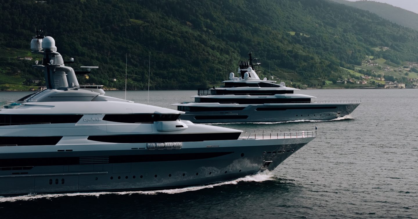 Superyacht Leviathan and support vessel Draak under way 