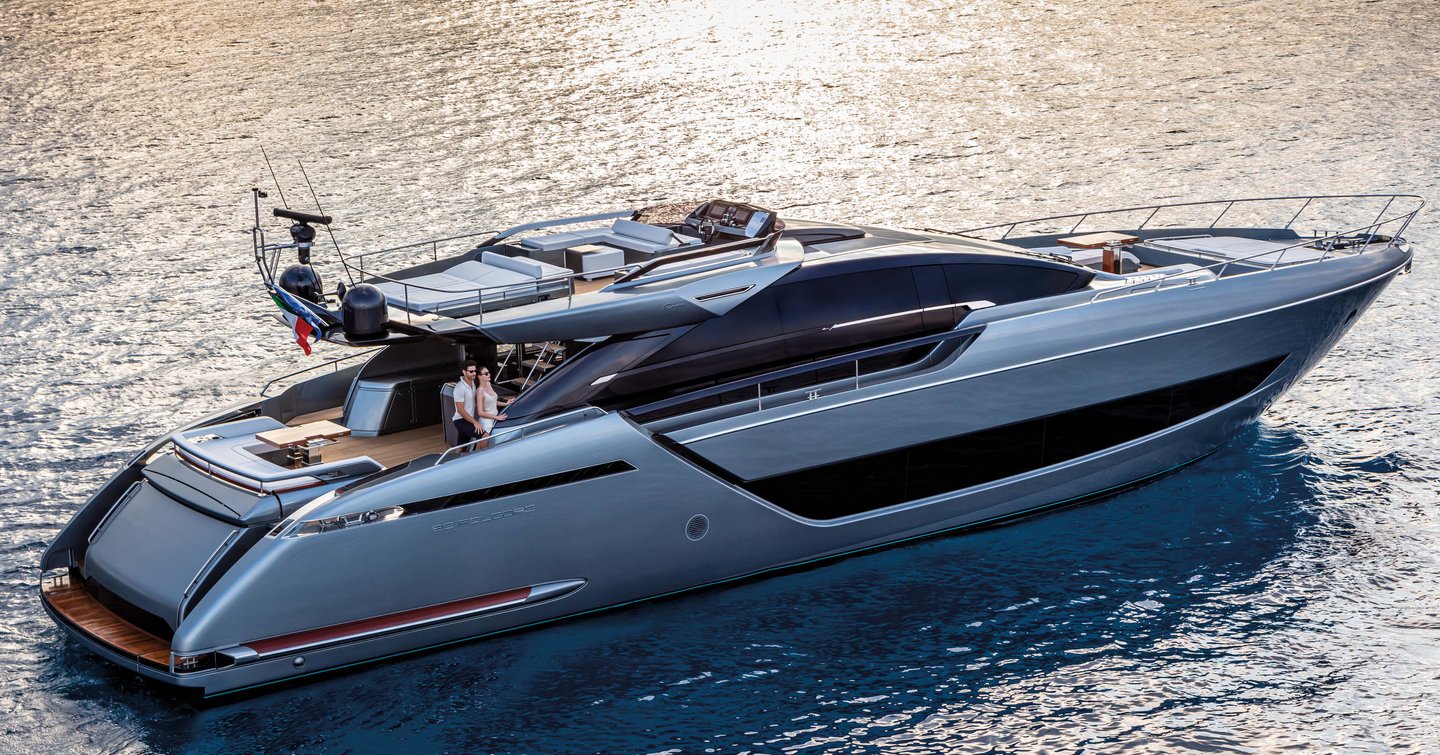 Riva 88' Folgore motor yacht at anchor stern view 