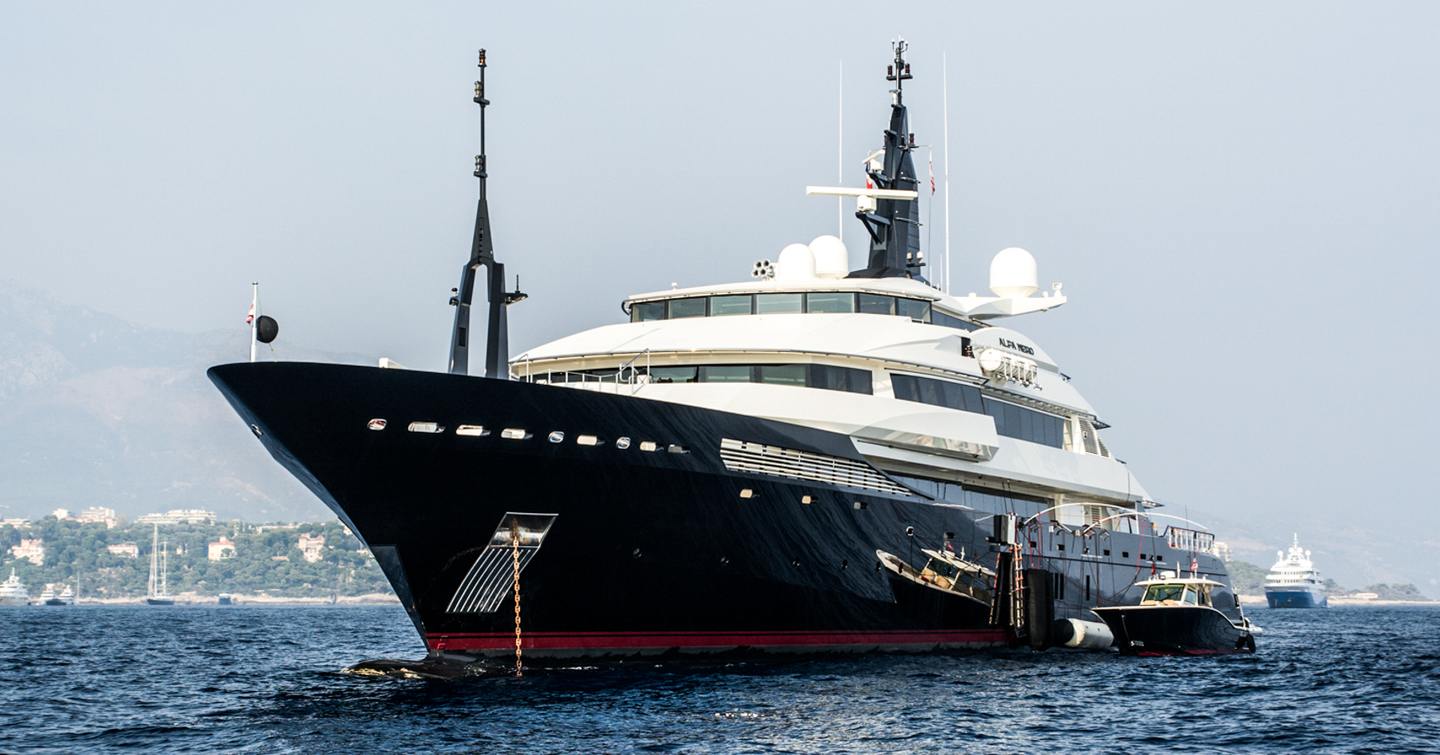 Oceanco superyacht ALFA NERO anchored in a flat blue sea