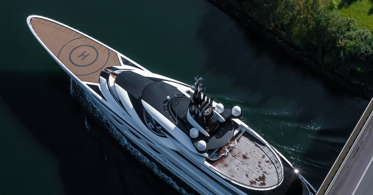 Superyacht AHPO on water  going under bridge