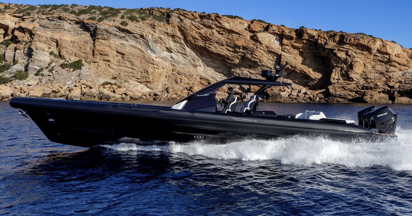 Technohull Alpha 50 boat underway side view 