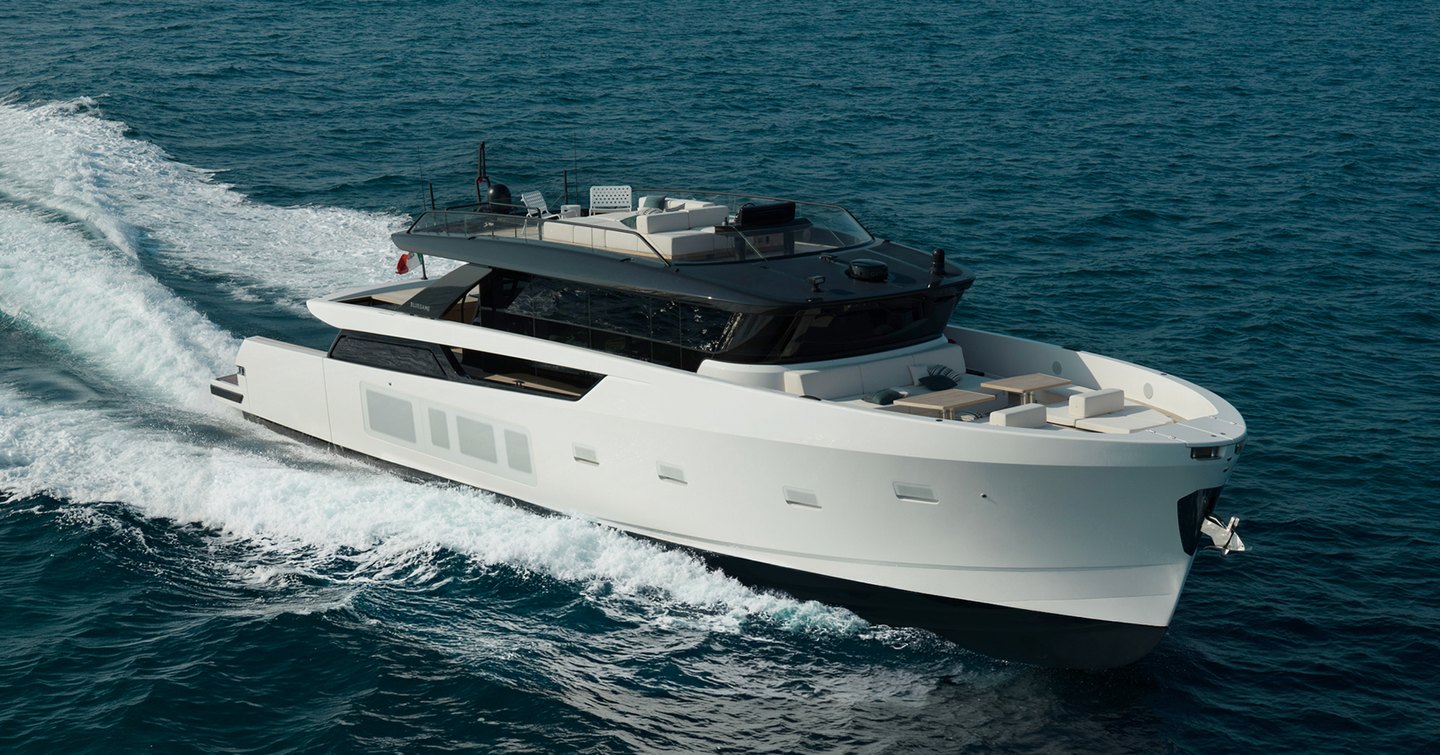 Bluegame BGX83 yacht underway side view 