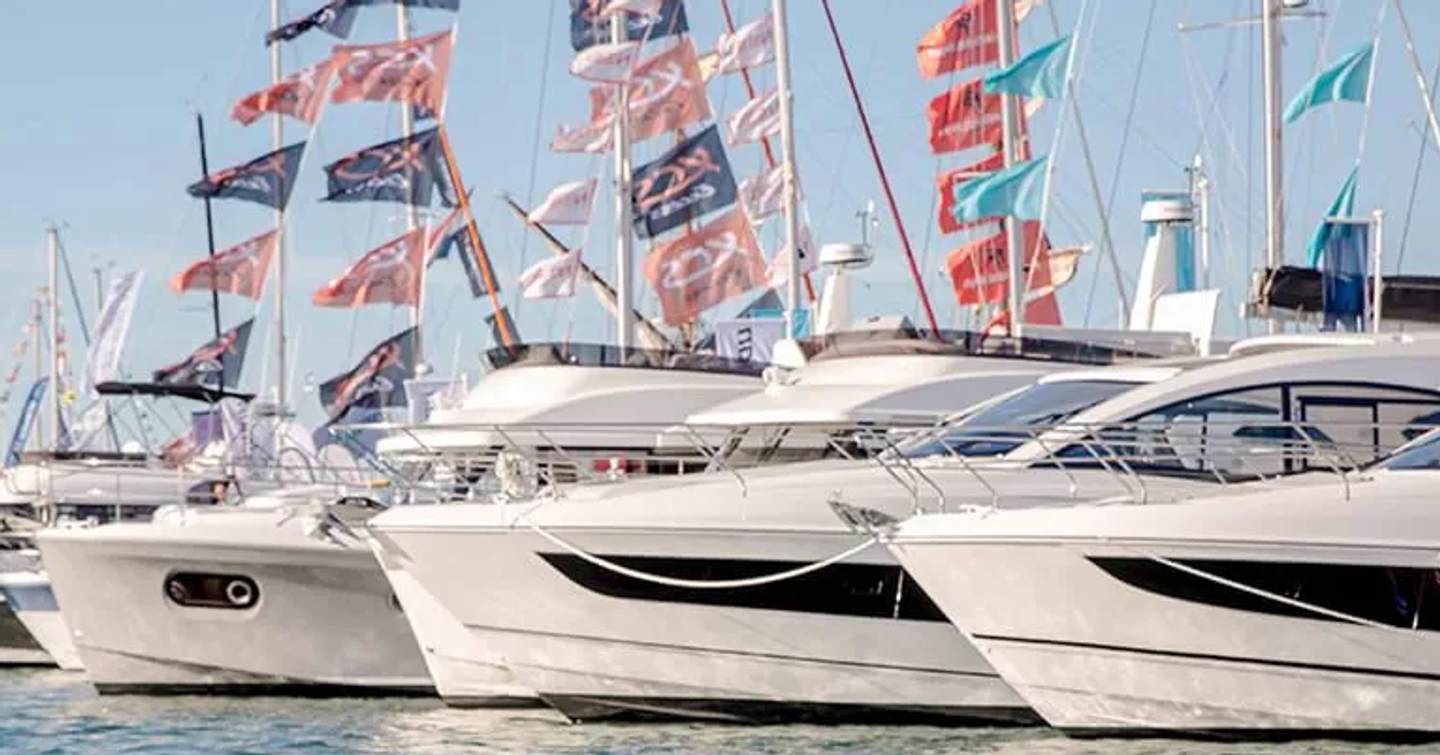 Motor yachts docked at boat show 