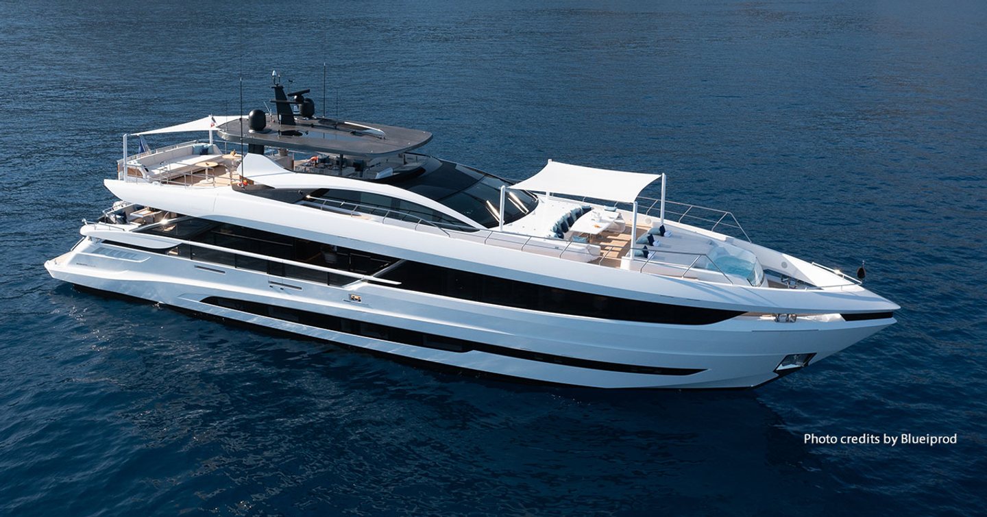 Mangusta Gransport 33 motor yacht at anchor with fordeck canopy up