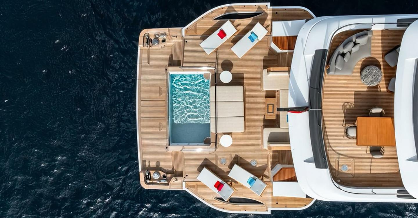 Aerial shot of superyacht Contigo's aft with swimming pool