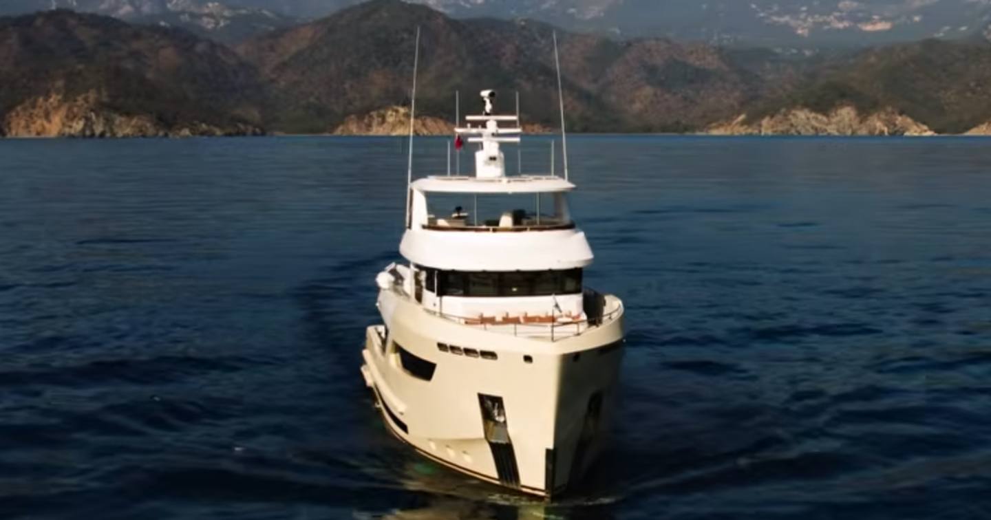 Bering B88 motor yacht at anchor bow view 
