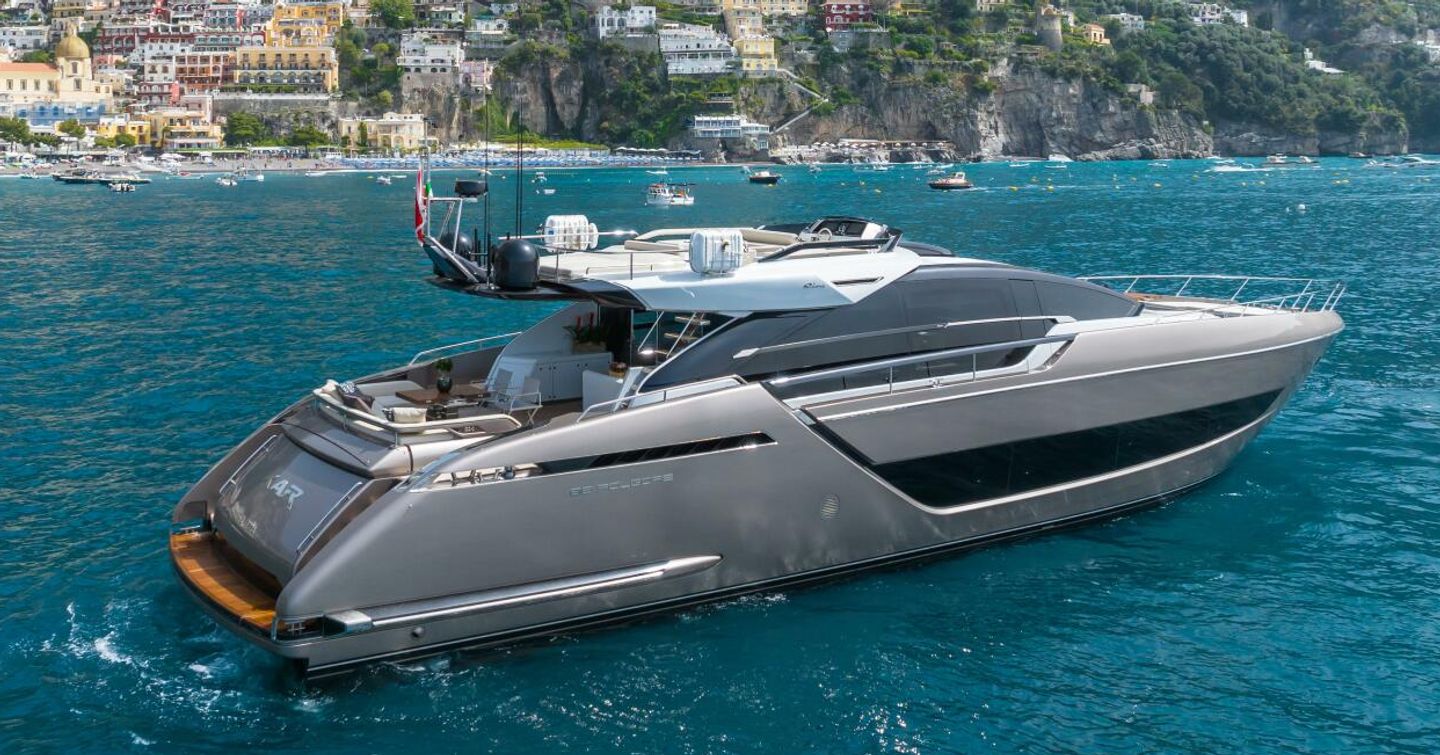 Riva motor yacht Kar at anchor side view 