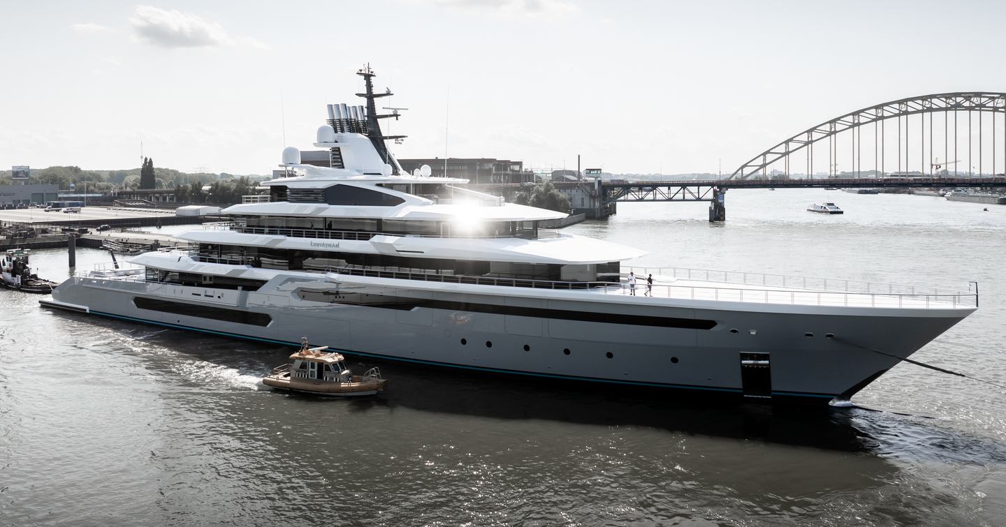 Superyacht Leviathan in front of bridge and tug boat 