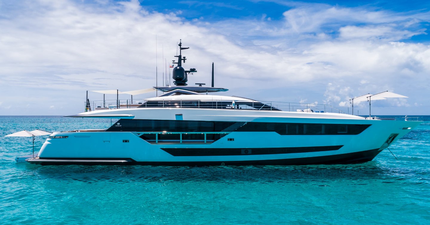 Custom Line Saetta 120' motor yacht at anchor 