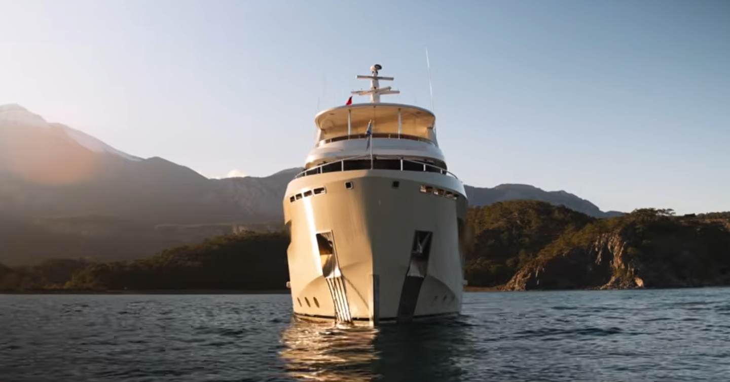 Bering B88 motor yacht at anchor bow view 