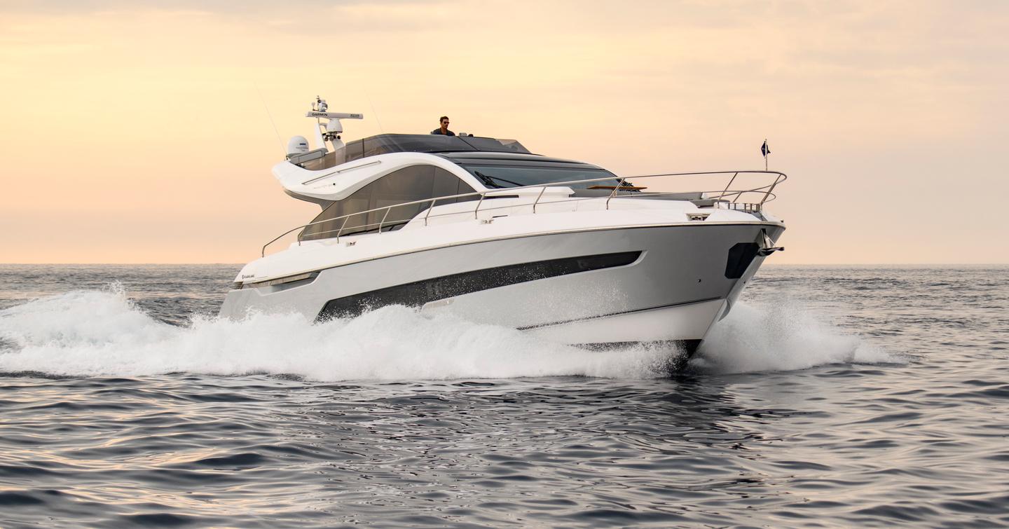 Fairline Phantom 65 underway, surrounded by sea.