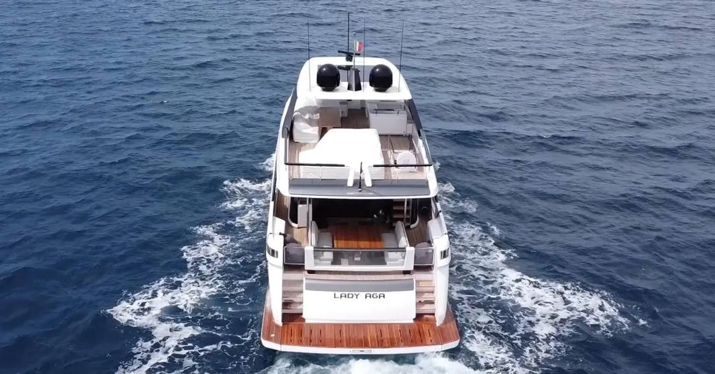 Ferretti motor yacht Lady Aga underway stern view 