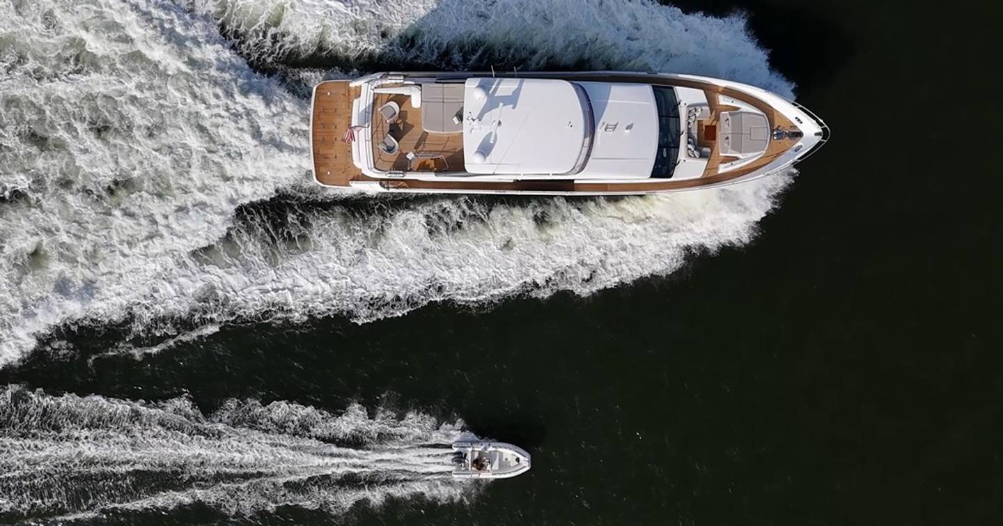 Aerial view of Motor Yacht Lady J under way next to tender 