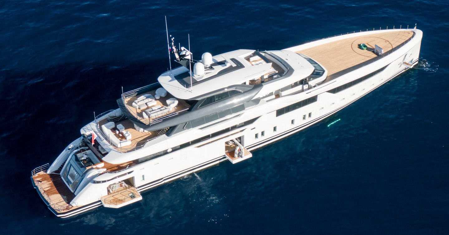 Superyacht MALIA at anchor with her fold down balconies showing