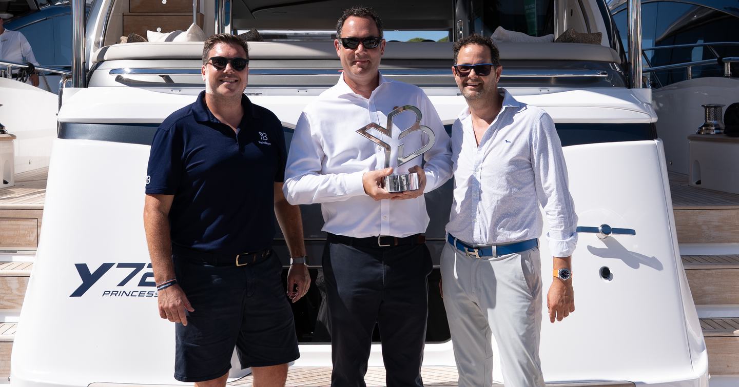 Will Green, CEO of Princess Yachts, with YachtBuyer’s Jack Haines and Kevin Bodington during the Y72’s Hall of Fame trophy handover at Cannes.
