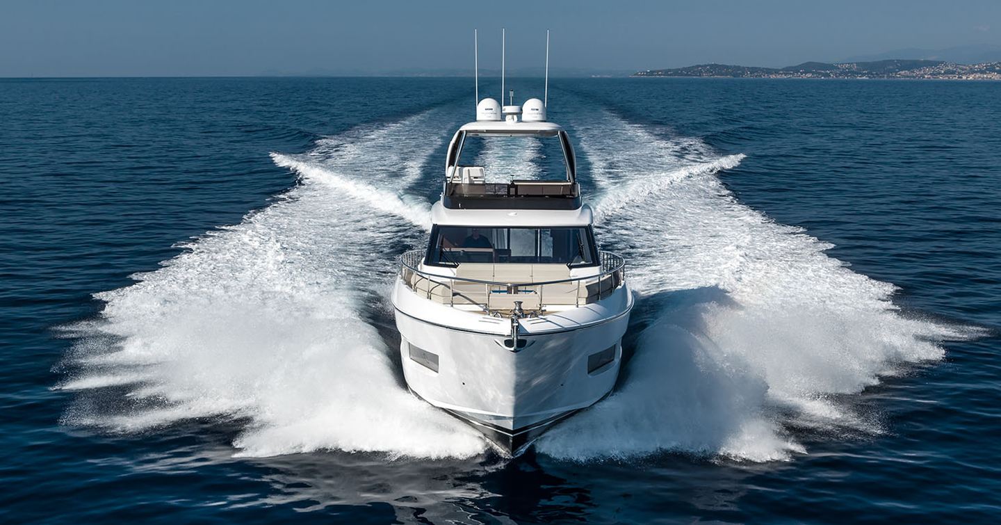 Ferretti 670 motor yacht underway bow view