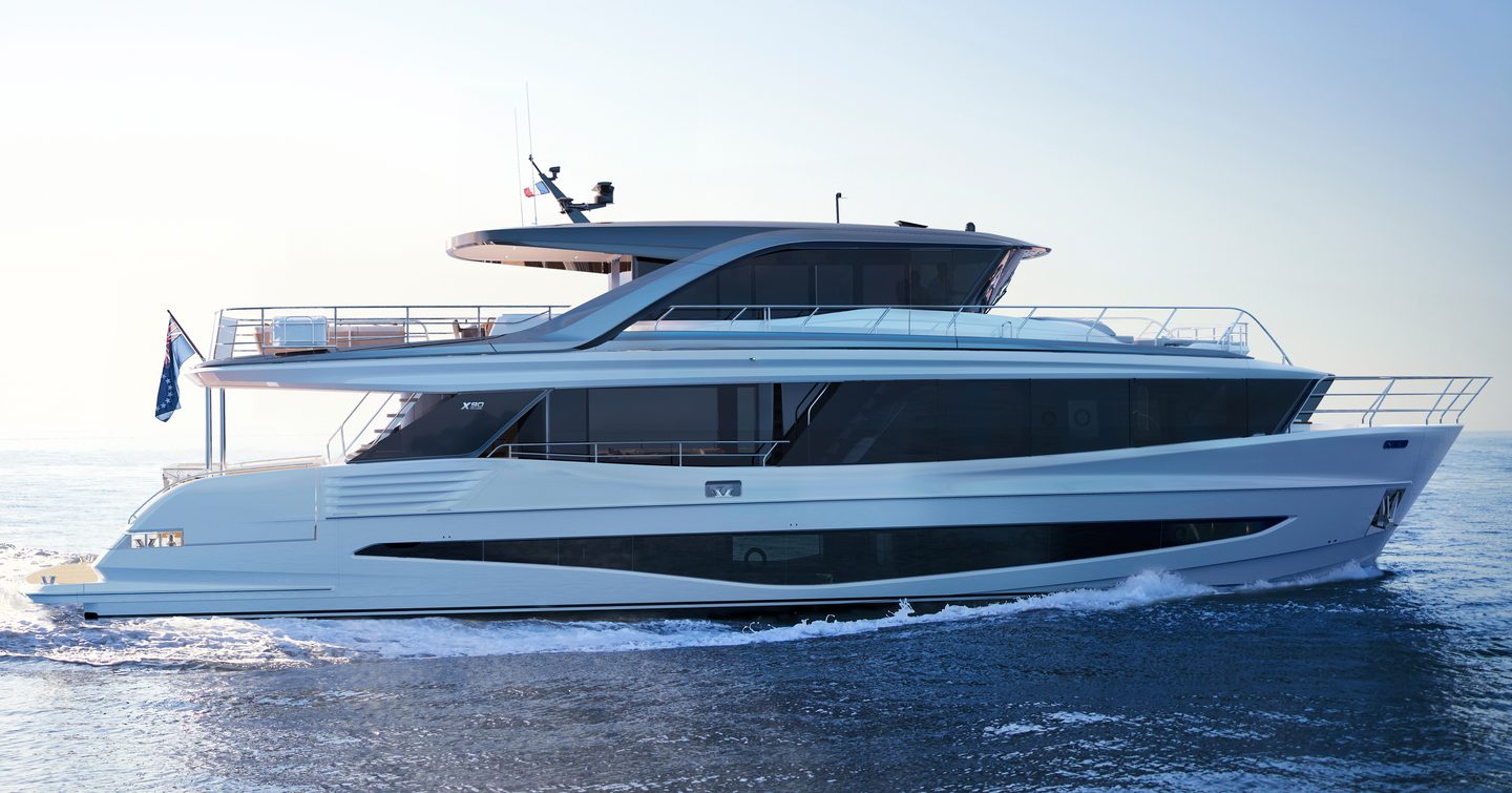 Princess X90 flybridge yacht underway side view 