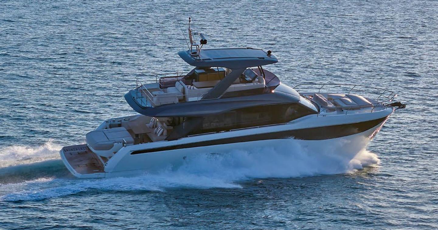 Prestige F6.7 yacht underway side view 