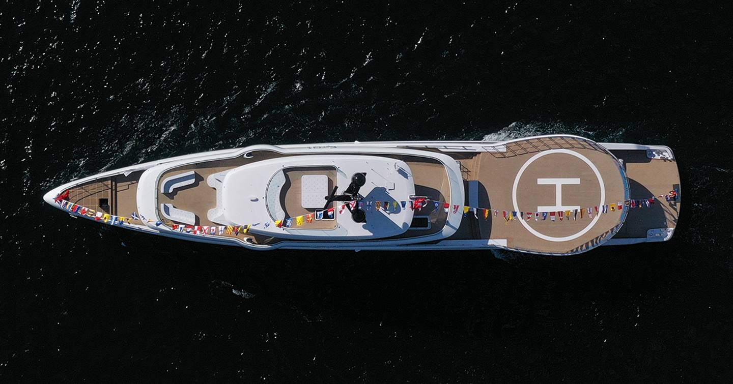 Mengi Yay superyacht Amphib II at anchor aerial view 