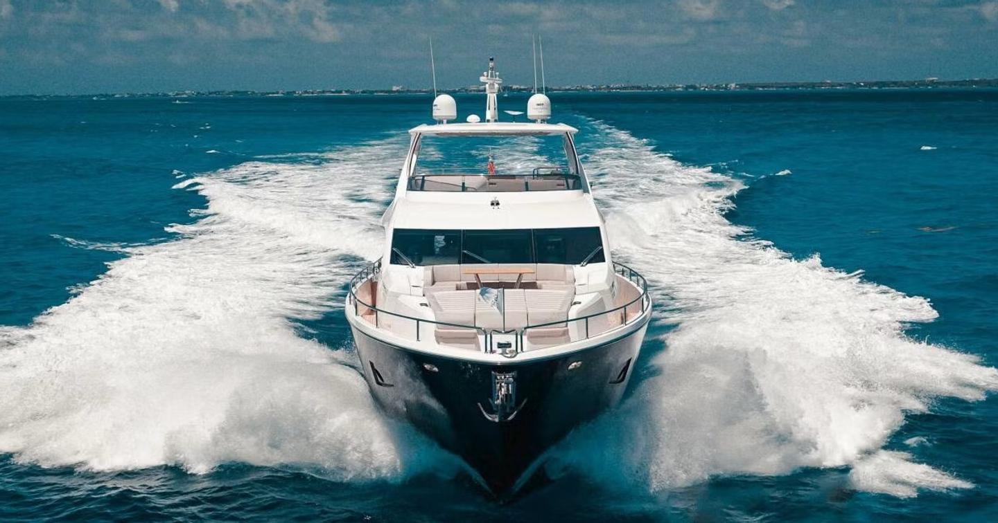 Sunseeker motor yacht Tatis underway at speed bow view