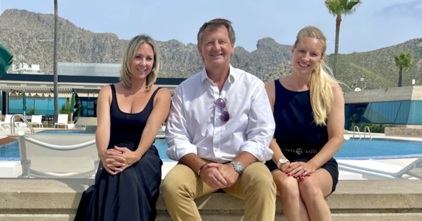 Fairline yachts representatives and dealers. Pictured sat in front of a swimming pool. (L to R) Victoria Oxley, Robbie Head, Maria Blyth-Brown