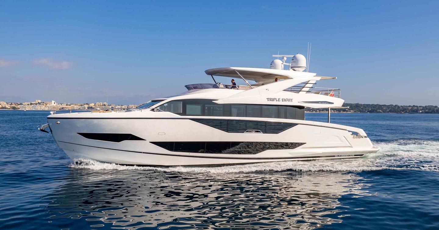 Sunseeker yacht TRIPLE EIGHT shown in running shot, port bow and side profile, from water level, on bright day