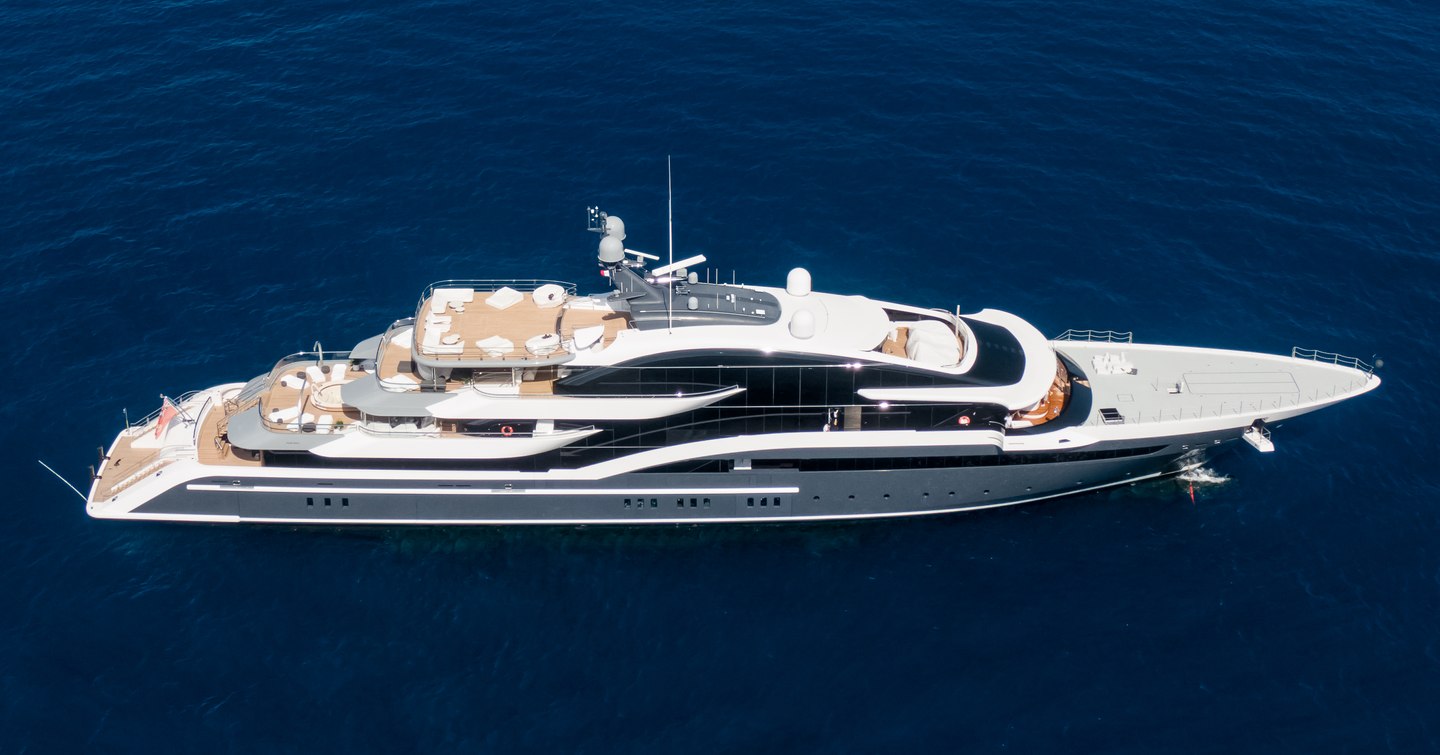 Oceanco superyacht DAR sits at anchor in a deep blue sea