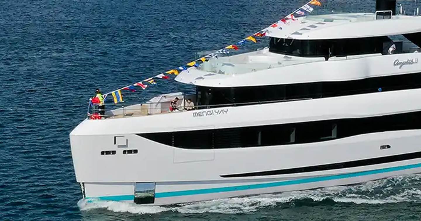Mengi Yay superyacht Amphib II underway bow view 