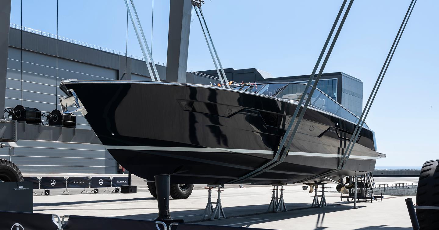 First Itama 70 motor yacht suspended during launch bow view