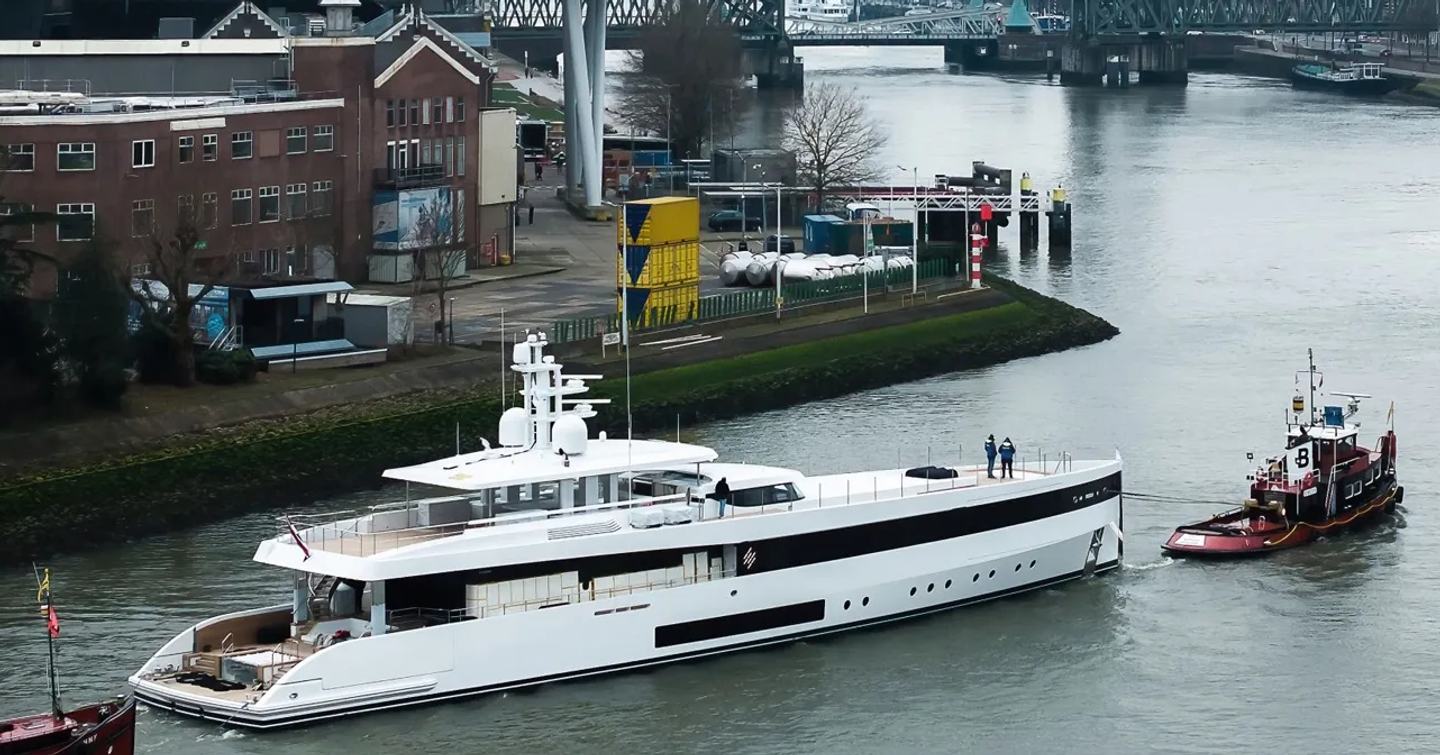 Feadship superyacht Graycliffs following tugboat in netherlands