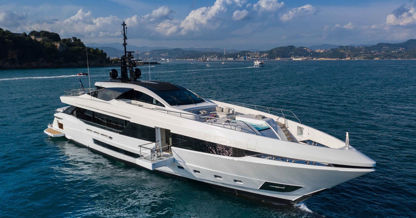 Mangusta GranSport 45 motor yacht at anchor with folded out balcony