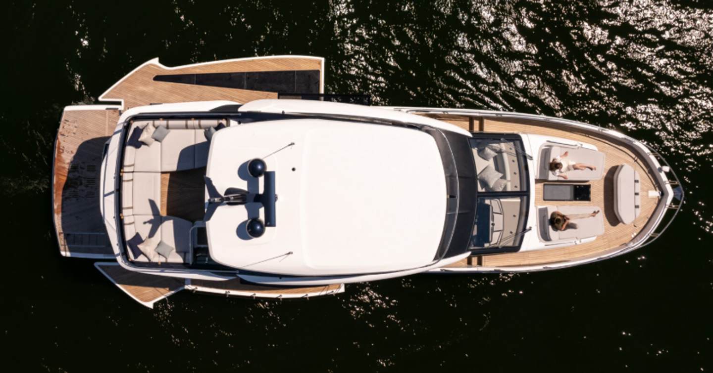 Aerial view of Galeon 620 Fly motor yacht at anchor