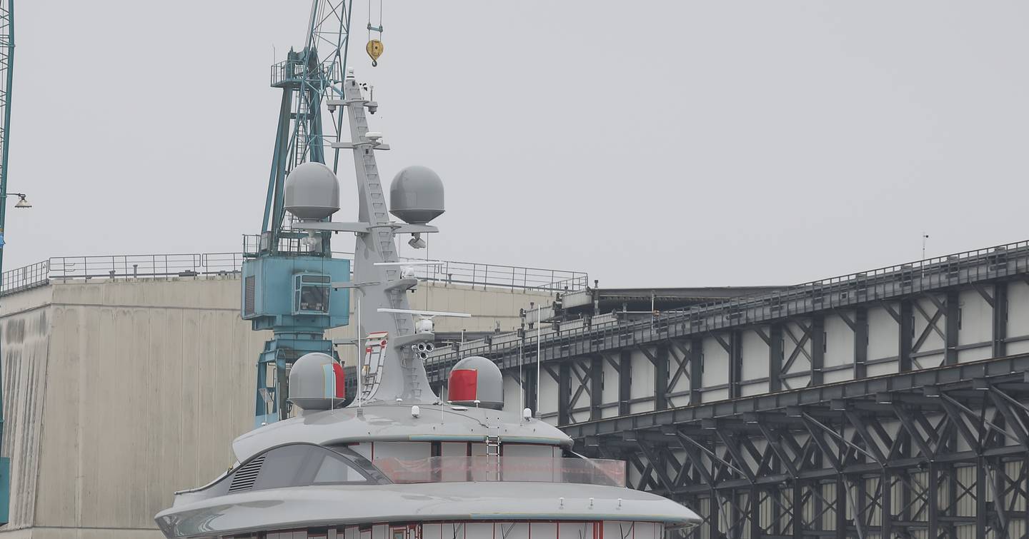 102m Lürssen Superyacht Jassi leaving Lurssen shipyard for launch behind tugboat