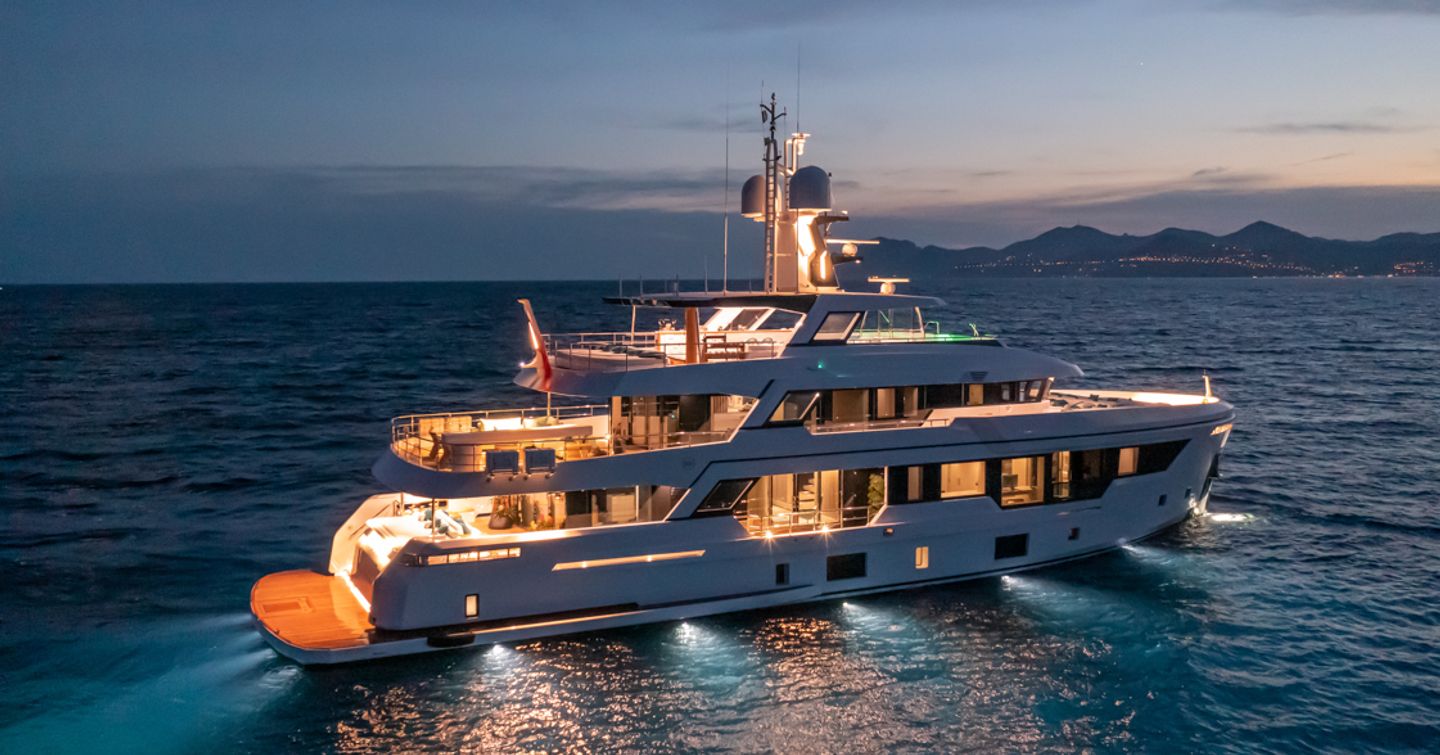 Rosetti superyacht EMOCEAN lit up at night