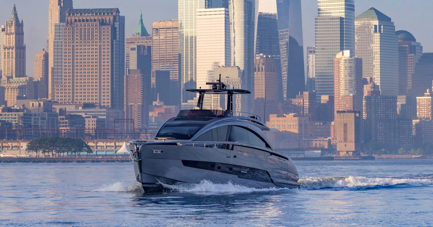 Pershing GTX80 motor yacht underway against the Manhattan skyline