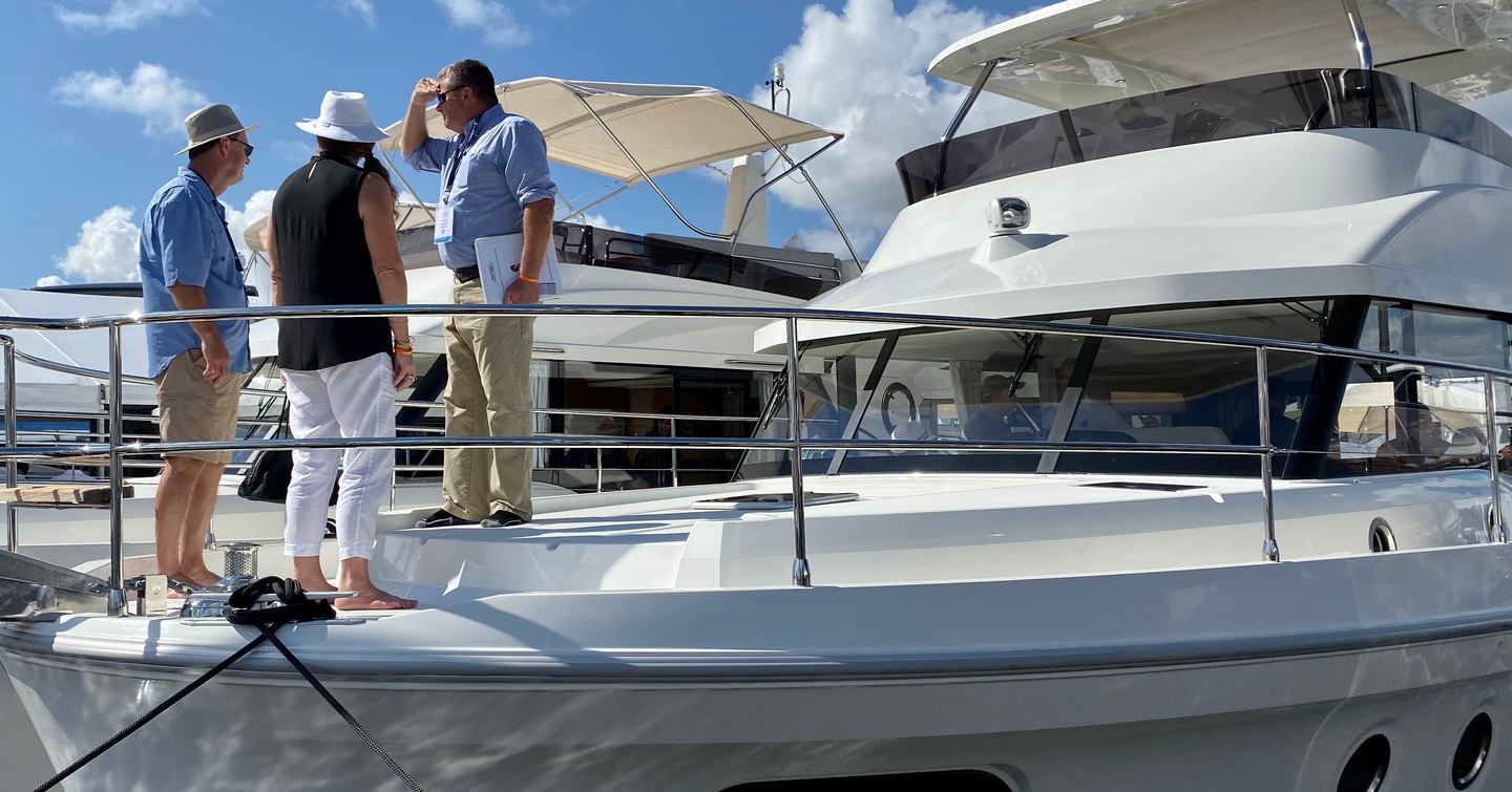 A stock boat with prospective owners and a broker