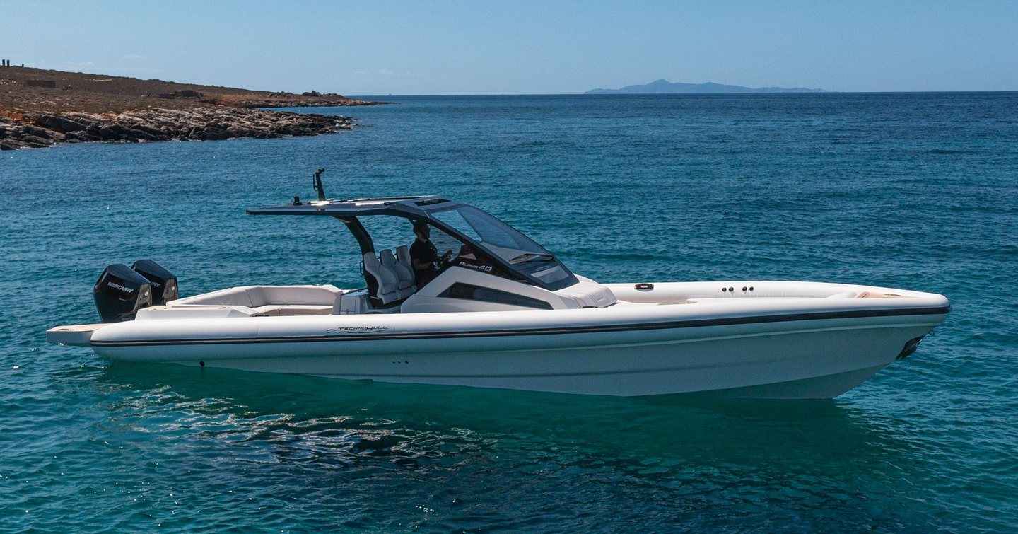 Technohull Alpha 40 dayboat at anchor