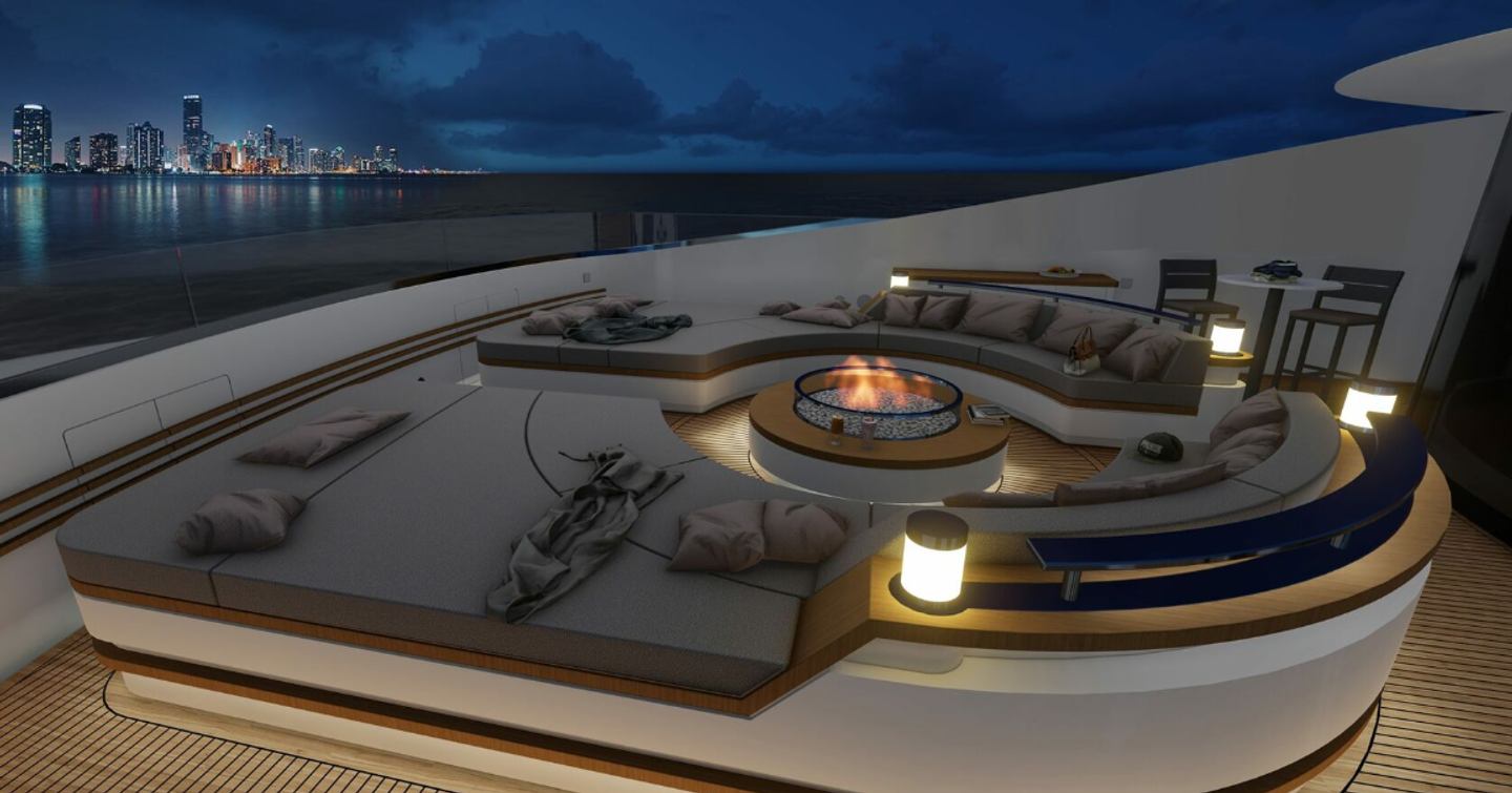 The firepit atop Oceanco Project VOLARE features circular seating and ambient lighting