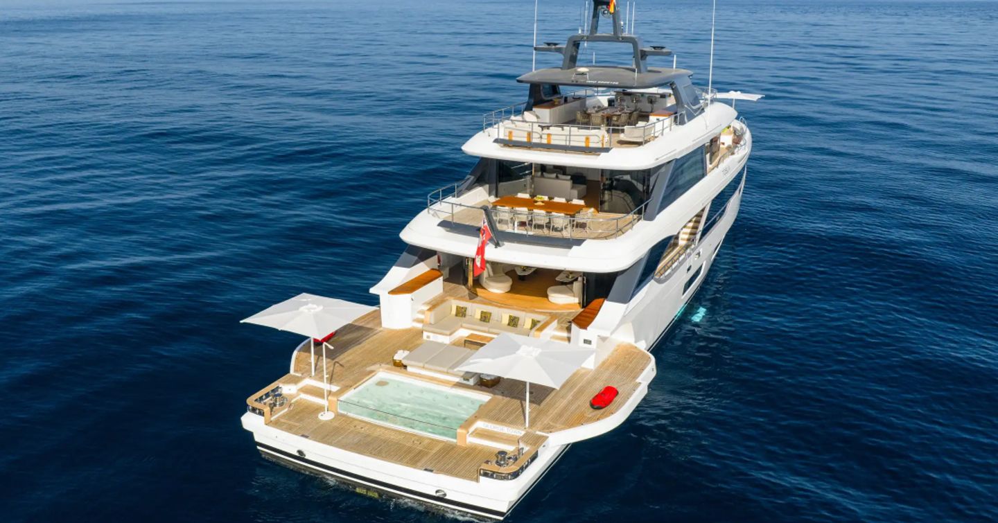 Superyacht Tosuna at anchor with fold down sides on beach club