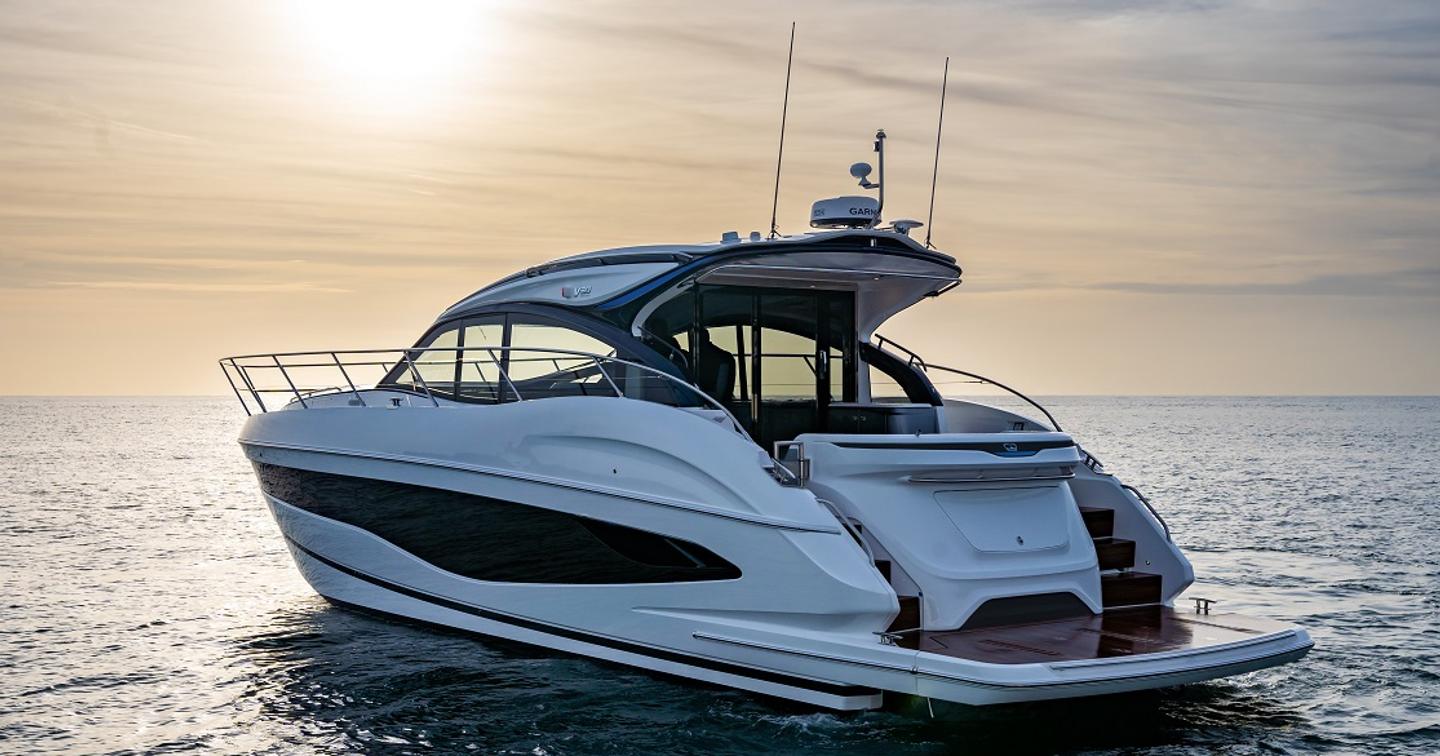 Princess V50 motor yacht at anchor stern view