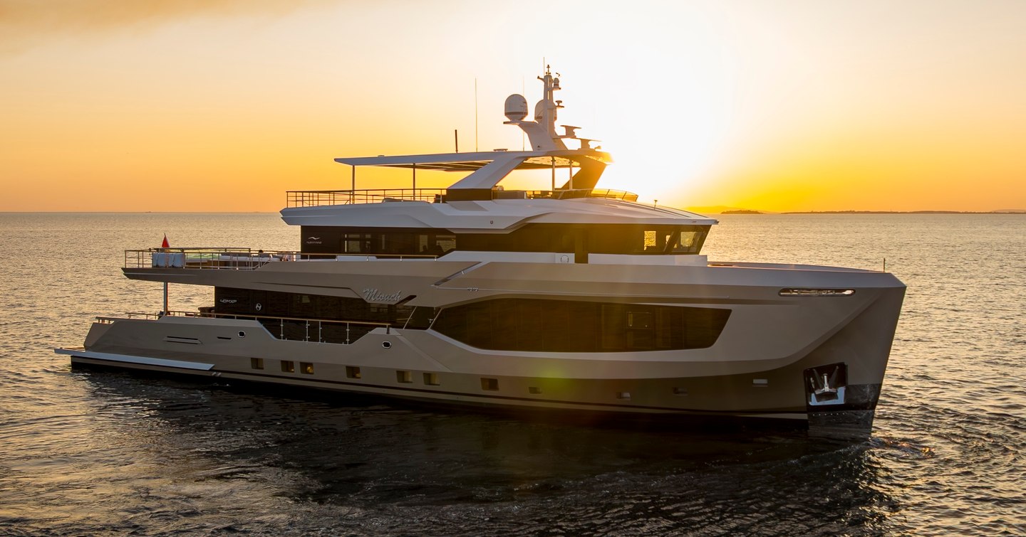Explorer Yacht Miouch at anchor at sunset